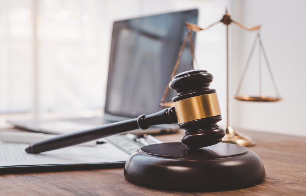 Criminal defense attorney reviewing marketing intake data and case growth metrics