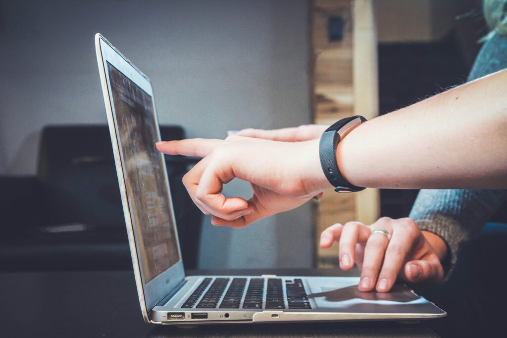 Law firm attorney using AI tools on laptop to streamline client intake and operations