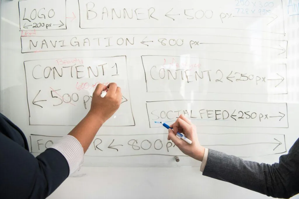 Legal professionals reviewing social media analytics and content calendar for their law firm marketing strategy